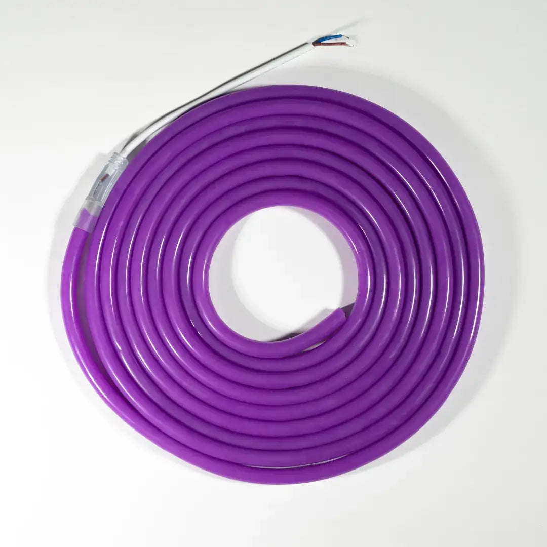 Purple neon flex LED strip with pre-soldered ends coiled in a circle for versatile lighting