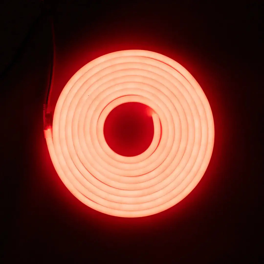 Glowing red neon circle with concentric rings on flexible neon LED strip with pre-soldered ends