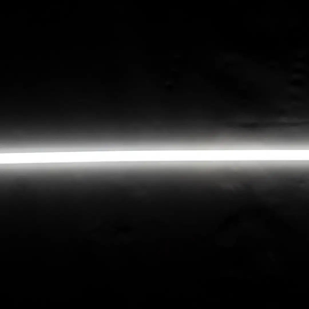 Flex Neon architectural lighting with bright horizontal glowing line against darkness