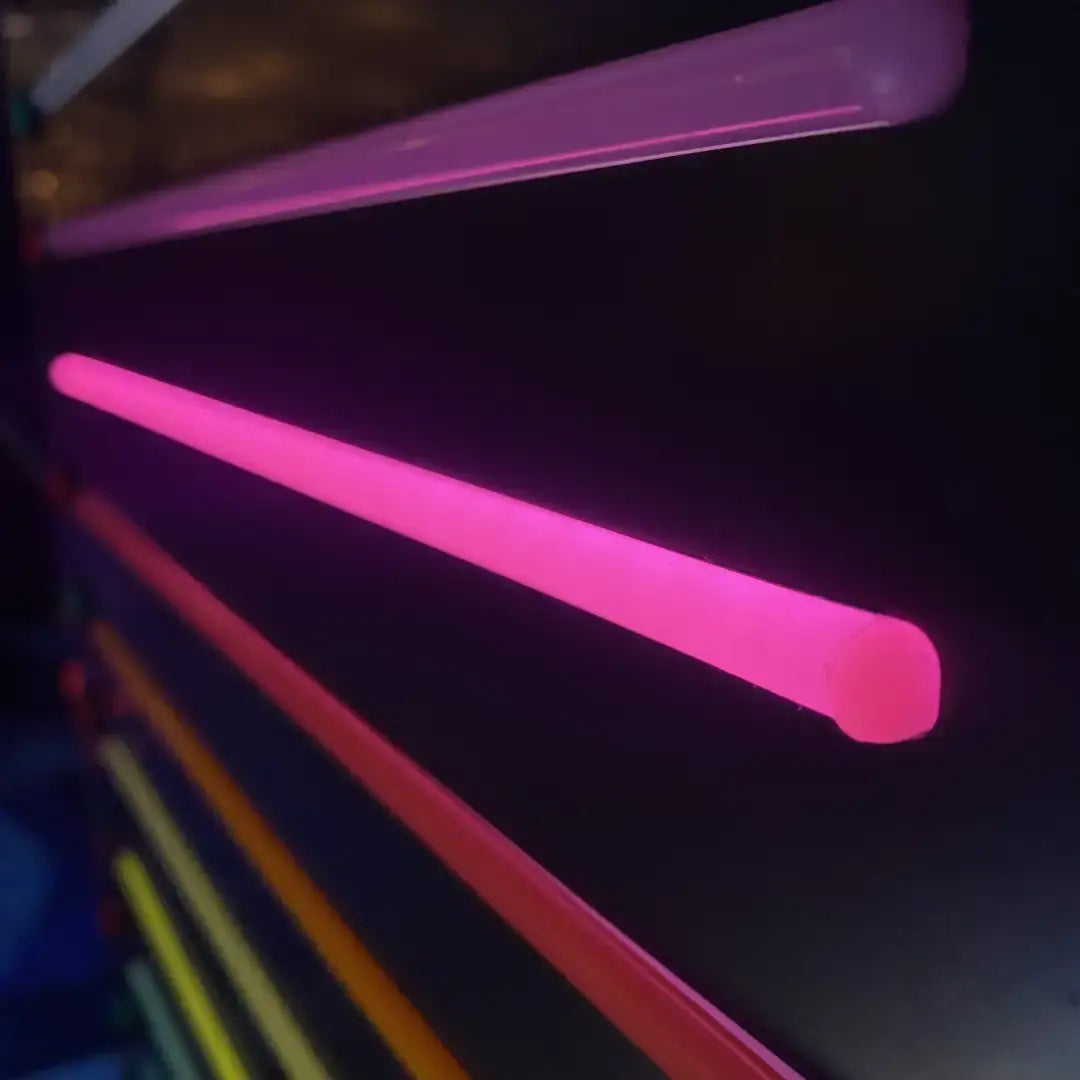 Glowing pink neon light tubes with coloured end caps for 8x16 flex neon installation