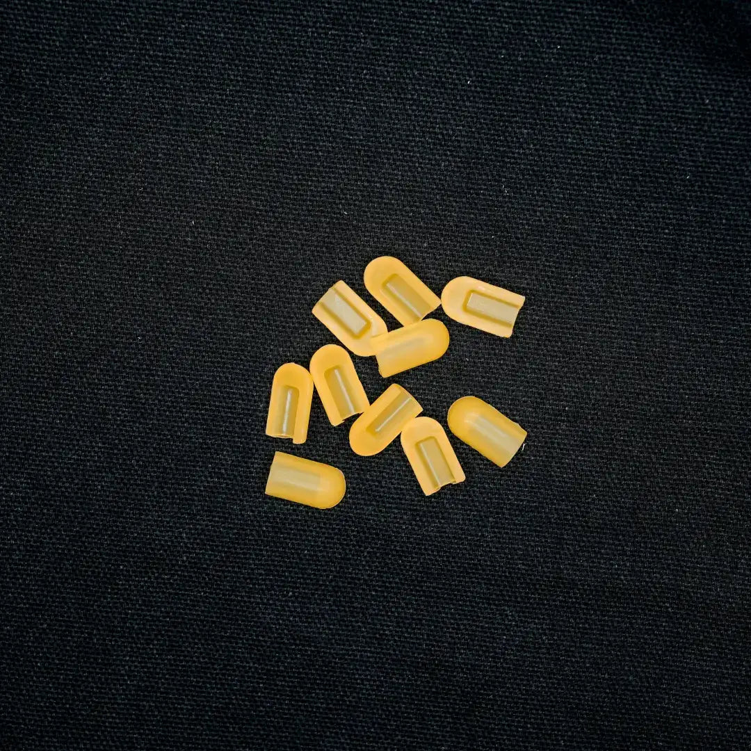 Yellow plastic LED light covers scattered together for 8x16 coloured end caps, flexible neon lighting