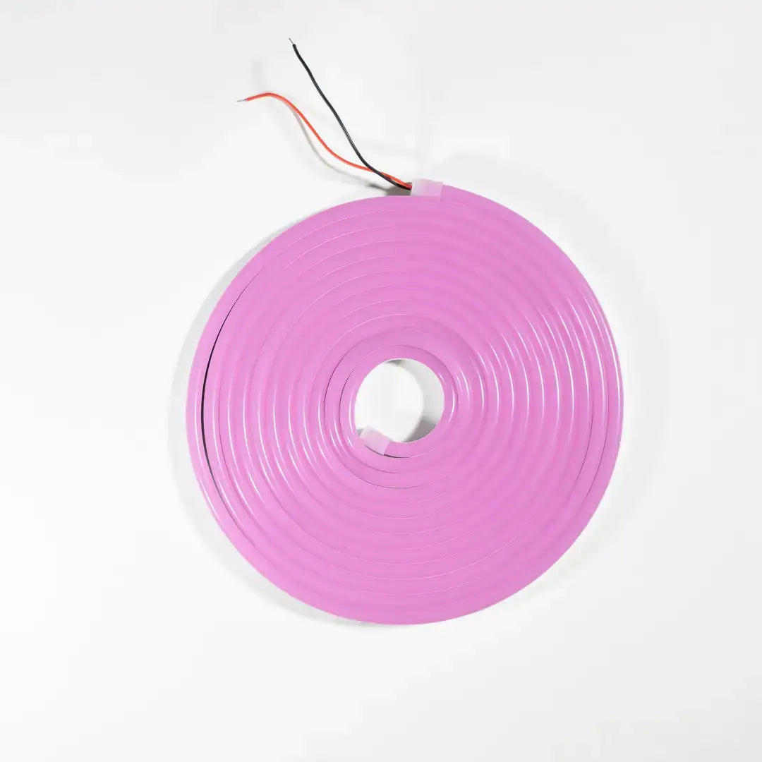 Pink circular flexible neon LED strip coiled into a flat spiral for architectural strips