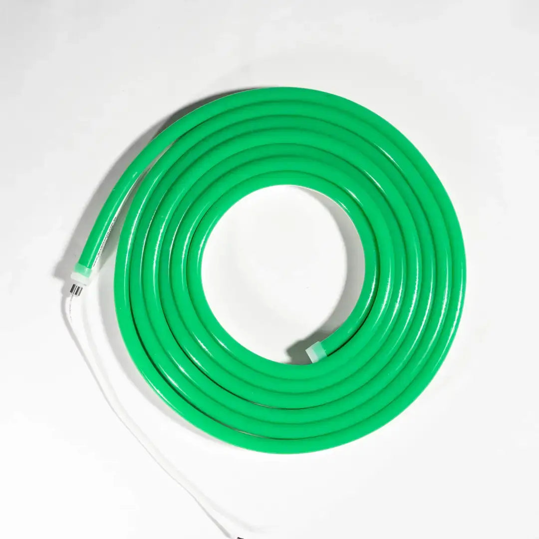 Bright green coiled flexible neon LED strip with white connectors for architectural lighting