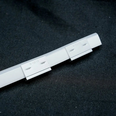 White plastic mounting bracket with multiple slots for 6x12 aluminium mount or 6x12 flex neon