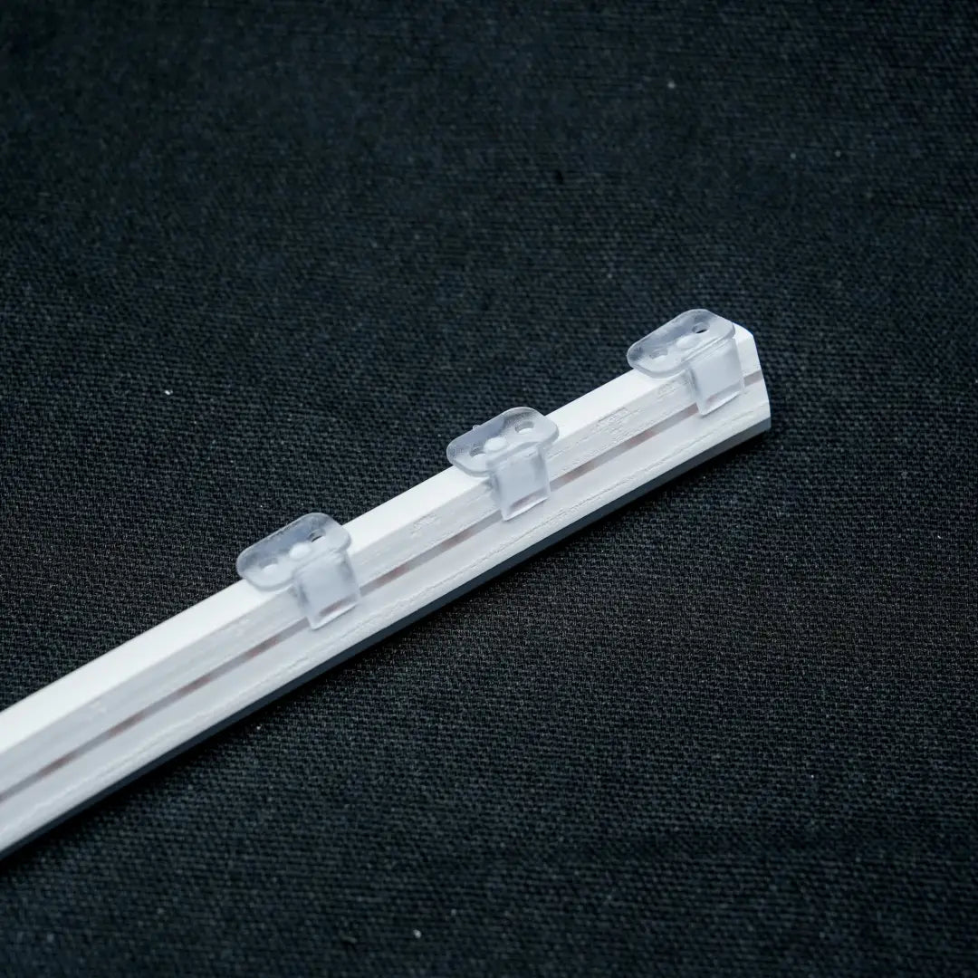 Clear plastic curtain track with 6x12 plastic mount clips for 6x12 Flex Neon projects