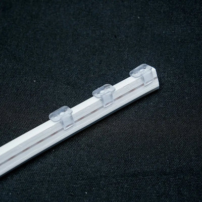 Clear plastic curtain track with 6x12 plastic mount clips for 6x12 Flex Neon projects