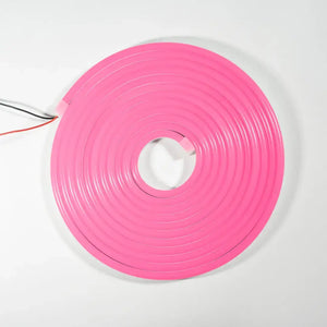 Pink neon flex LED strip coiled into a circle, ideal for architectural strips and 6x12 Flex Neon