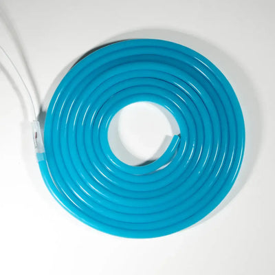 Bright turquoise neon flexible LED strip with pre-soldered ends in a circular shape
