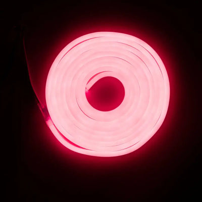 Glowing pink neon circle with concentric spiral rings showcasing flexible neon LED strip with pre-soldered ends