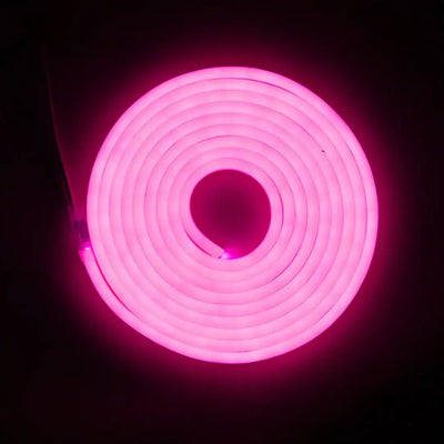 Glowing pink neon spiral tube forming a circle, flexible neon LED strip with pre-soldered ends
