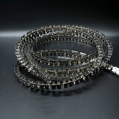 Coiled metallic bicycle or motorcycle chain with shiny silver finish on 8x16 Flex SS Mounting Channel