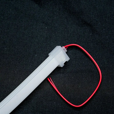 White plastic tube with red wire attached for 8x16 quick connector, effortlessly linking flexible neon