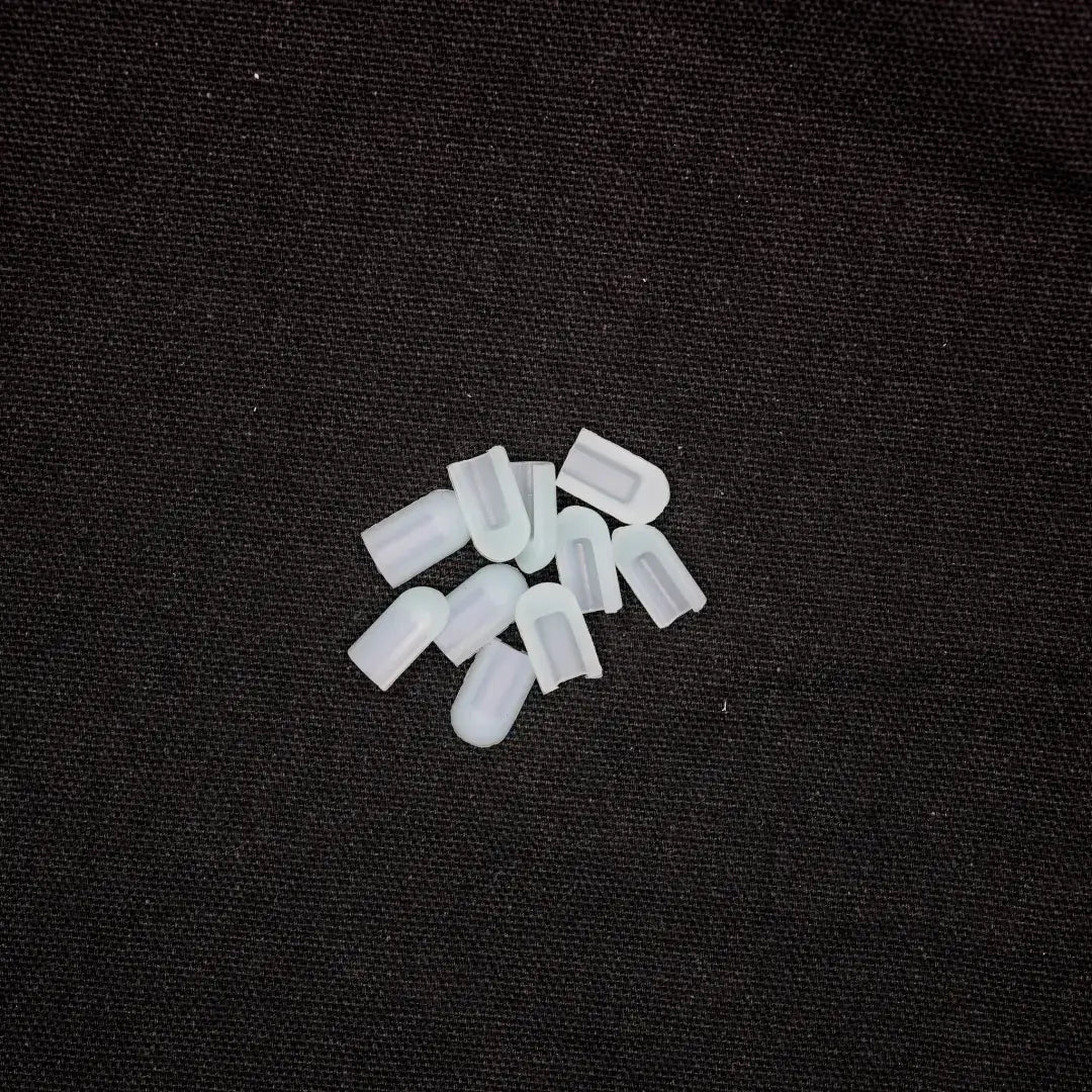 Pile of captivating icy blue plastic end caps from 6x12 flex neon collection