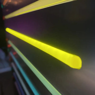 Glowing neon light strips in diagonal lines with Lemon Yellow 8x16 flex neon end caps