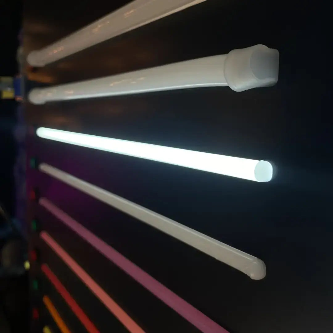 Glowing fluorescent light tube with coloured end caps for 8x16 flex neon installation