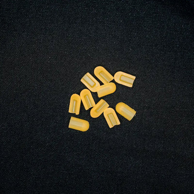 Yellow plastic LED light covers scattered together for 8x16 coloured end caps, flexible neon lighting