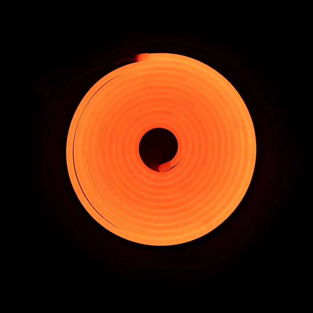Flexible neon architectural strips in tangerine orange with glowing circular spiral effect