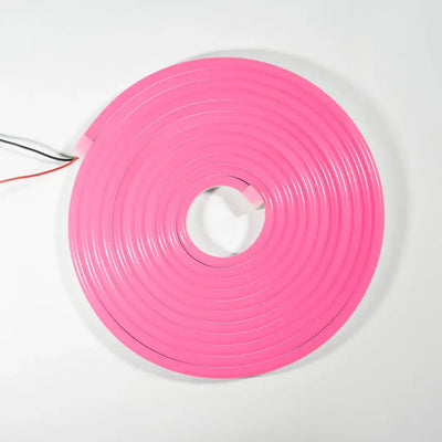 Pink neon flex LED strip coiled into a circular shape for flexible neon signs and architectural strips