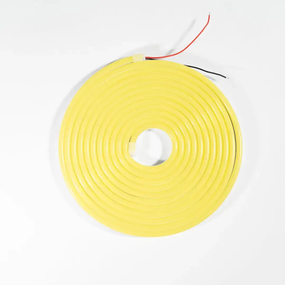 Yellow neon flex LED strip coiled in a circular shape for flexible neon architectural strips lighting designs