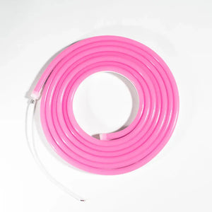 Flexible neon pink flex neon tube coiled in a circular shape for architectural strips