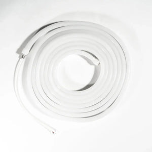 Flexible neon strip in neutral white 4000K forming a coiled spiral for horizontal bending