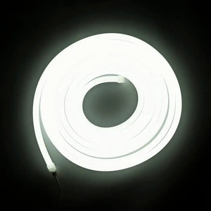 Glowing white flexible neon LED strip with horizontal bending in a circular shape for versatile lighting
