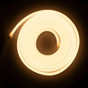 Glowing flexible neon LED strip forming a circular pattern in warm white 3000K