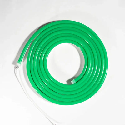 Bright green coiled flexible neon LED strip with white connectors for architectural lighting