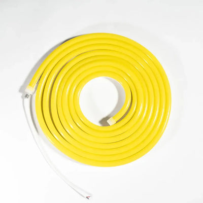 Yellow coiled garden hose with white connectors, ideal for architectural strips and horizontal bending