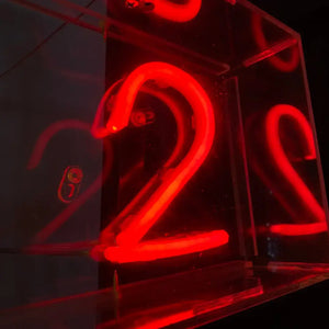 Glowing red neon number 2 on flexible neon LED strip with 8x10x16 PVC flex Fire Truck Red