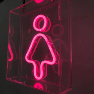 Pink neon bathroom sign with female symbol showcasing flexible neon LED strip lighting