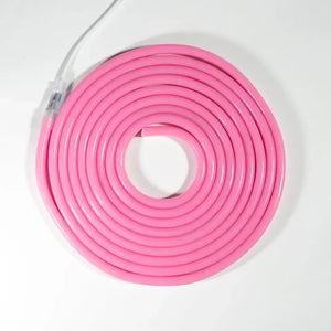 Pink neon flex tube coiled in a circle for flexible neon LED strip lighting